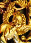 Close up of carved angel, cherub, pipe shade carving for Arizona State University, Tempe