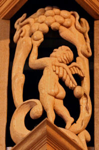 Carved wood sculpture, cherub figure, Episcopal Church of the Ascension, Seattle, WA