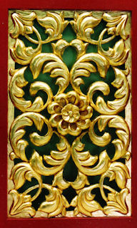 Gold leafed flower in wood panel for Arizona State University, Tempe