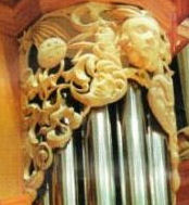 Wood-carved faces in sculpture of Gottfried and Mary Fuchs organ, Pacific Lutheran University, Tacoma WA