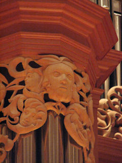Carved faces in wood sculpture for the Gottfried and Mary Fuchs Organ, Pacific Lutheran University, Tacoma Washington, wood carver Jude Fritts